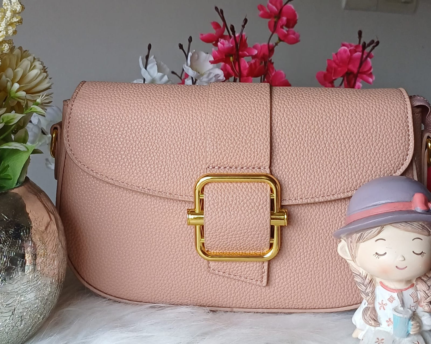 Peach Metal Lock Textured Sling Bag
