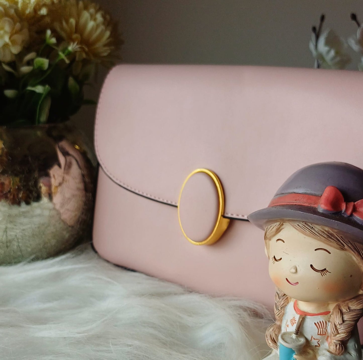 Peach Oval Lock Sling Bag
