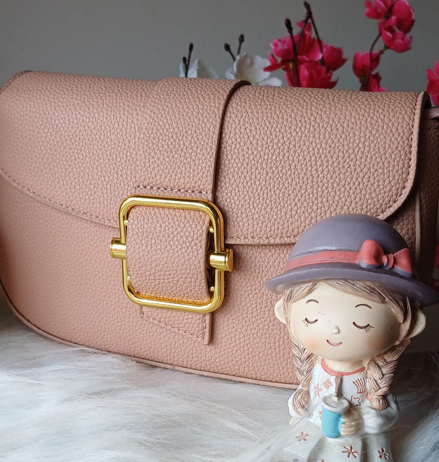 Peach Metal Lock Textured Sling Bag