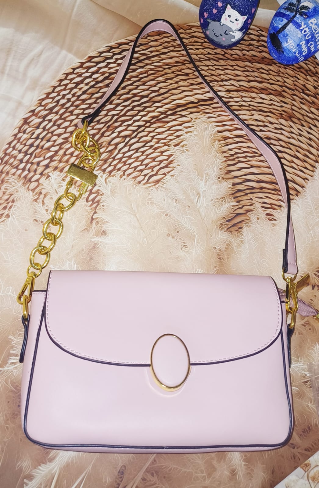 Peach Oval Lock Sling Bag