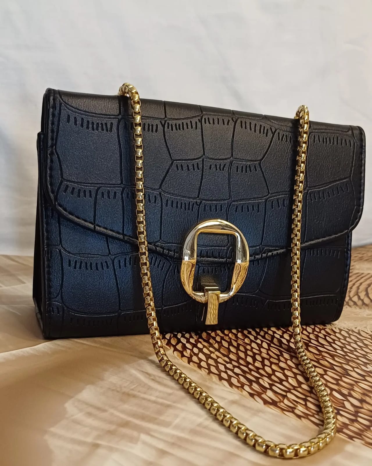 Black Q Lock Sling Bag