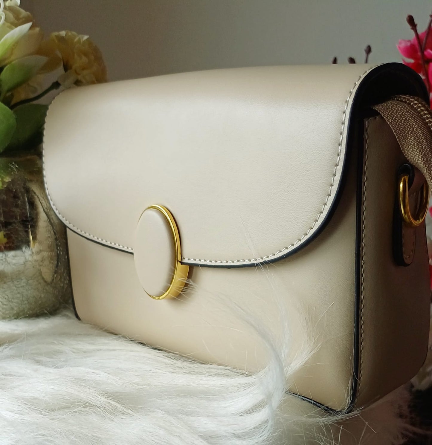Beige Oval Lock Sling Bag