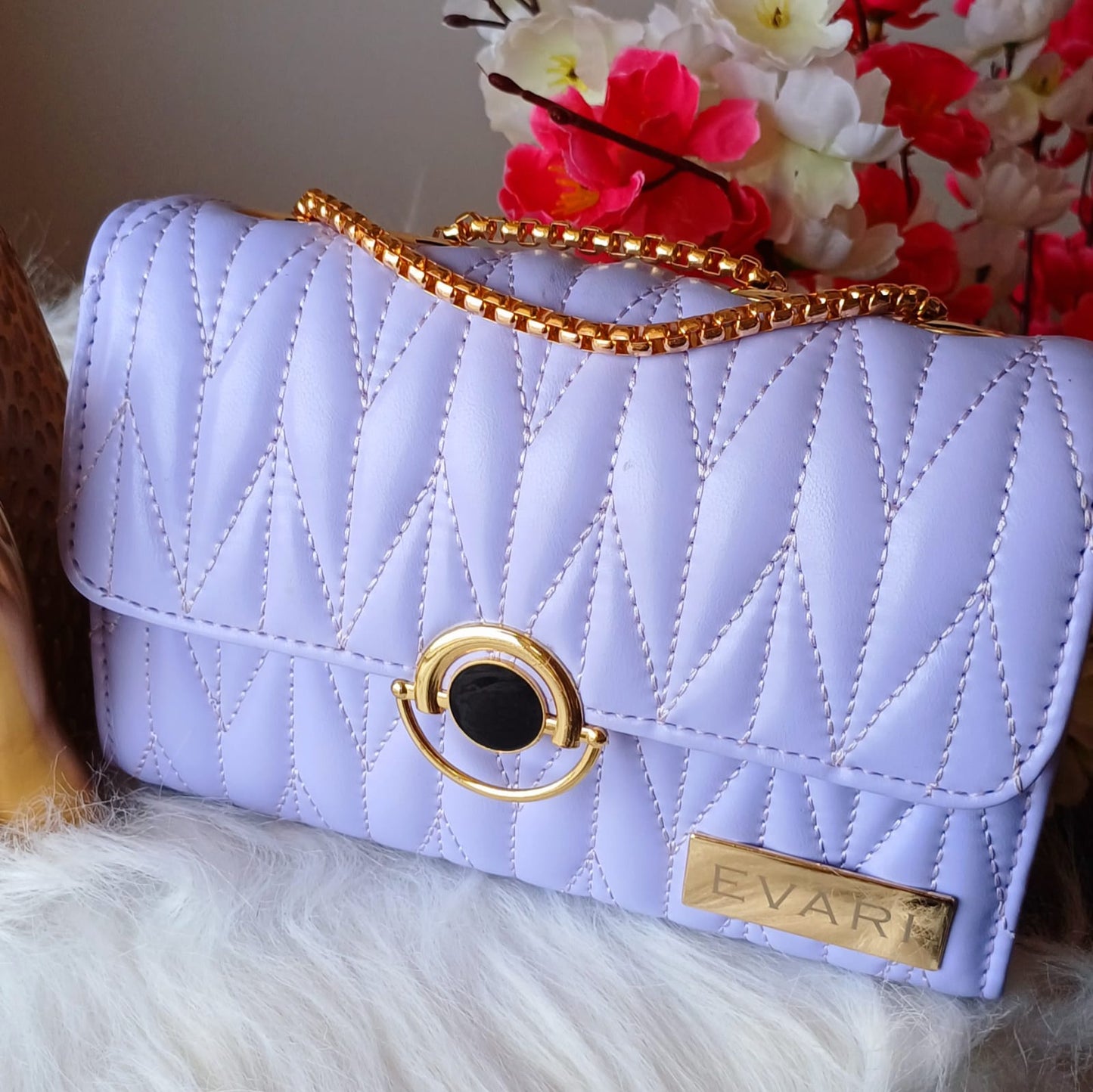 Lilac Round Lock Quilt Sling Bag