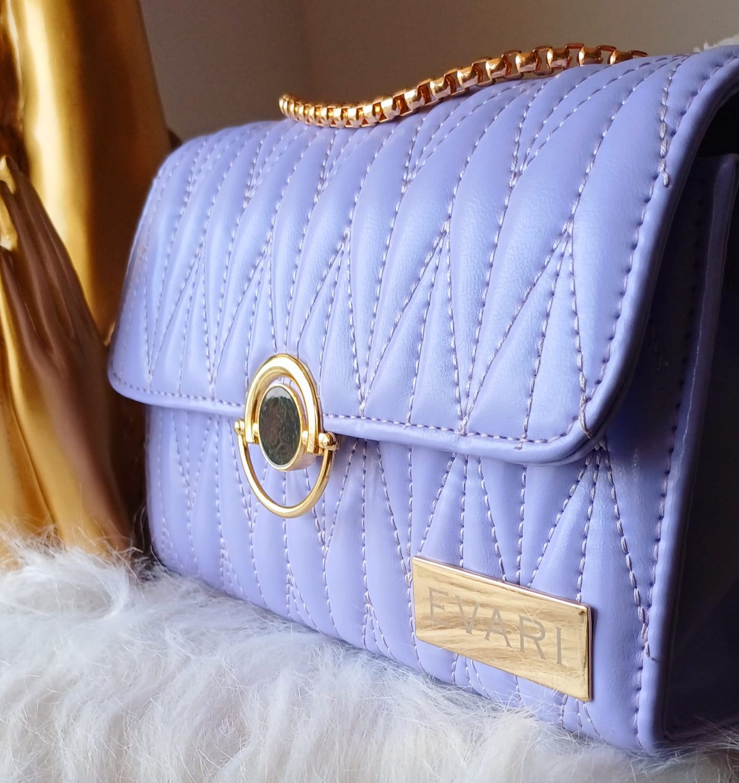 Lilac Round Lock Quilt Sling Bag