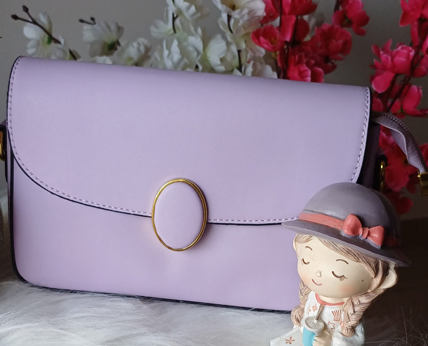 Beige Oval Lock Sling Bag