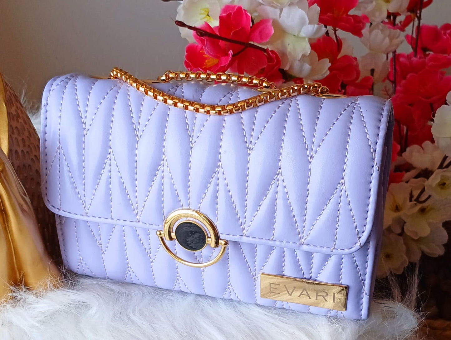 Lilac Round Lock Quilt Sling Bag