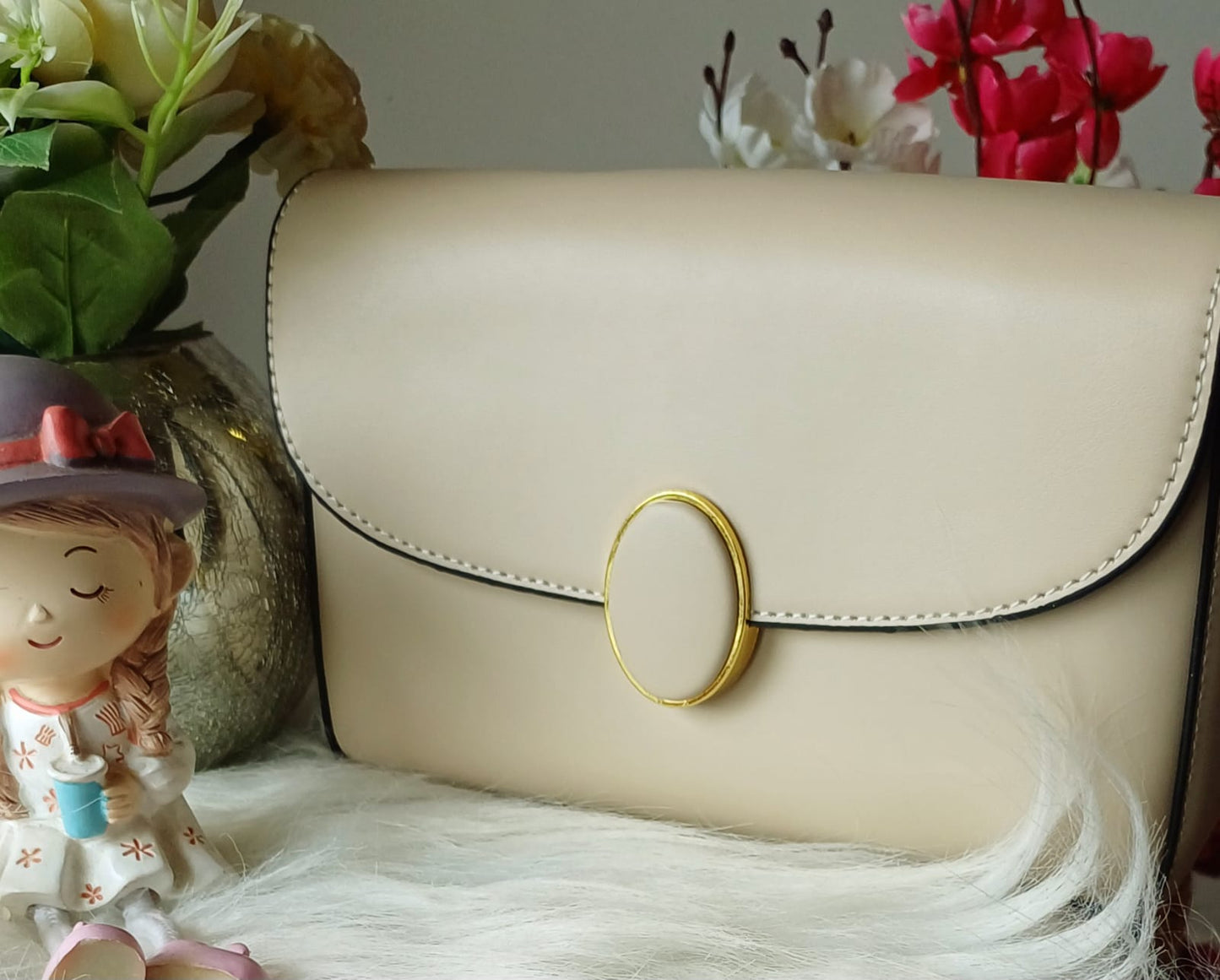 Beige Oval Lock Sling Bag