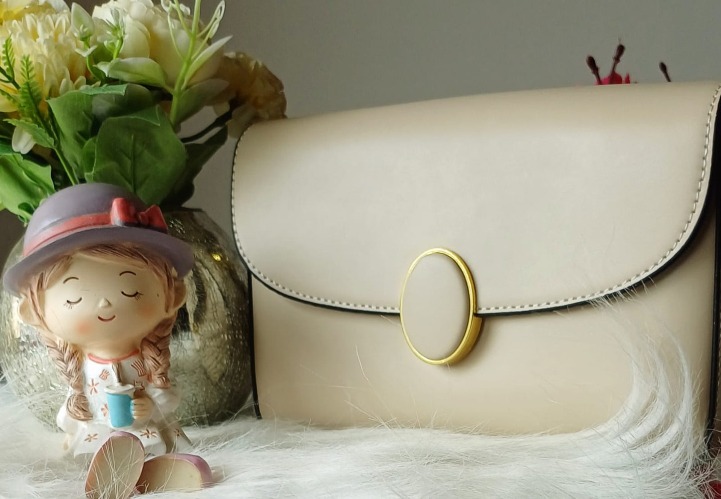 Beige Oval Lock Sling Bag